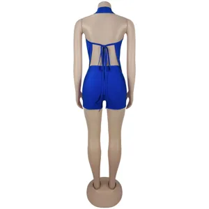 Detail view of sexy backless halter strap romper shorts in royal blue for women clubwear