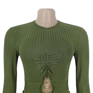 Detailed view of olive green ribbed long sleeve jumpsuit with stylish waist cutout ring.