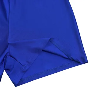 Close-up detail of royal blue stretch fabric with neat stitching, exquisite texture.