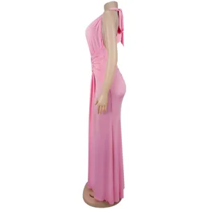 Pink halter deep V gathered fisheye evening dress side view showing elegant waistline.