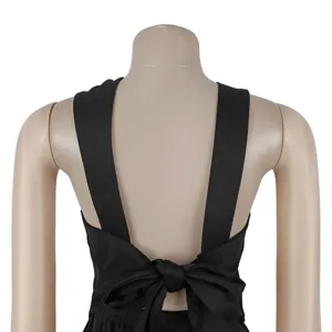 Black sleeveless backless top featuring wide straps and a stylish bow tie detail at the back.