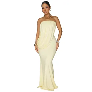 Stunning strapless draped fishtail long dress in light yellow, perfect for elegant evening parties.