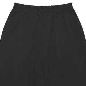 Casual black trousers detail, elastic waistband design, comfortable daily wear basic pants.