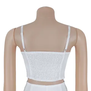 White smocked crop top with adjustable straps for women, stylish two-piece set back view.