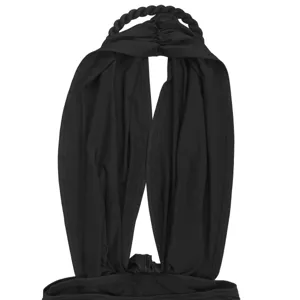 Detail view of a black halter mini dress featuring a chic deep V neck and braided strap.