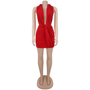 Red halter neck mini dress detail view, showing sexy deep V-cut and stylish ruched design.
