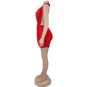 Side view detail of red backless halter mini dress showcasing fitted silhouette and stylish draping.
