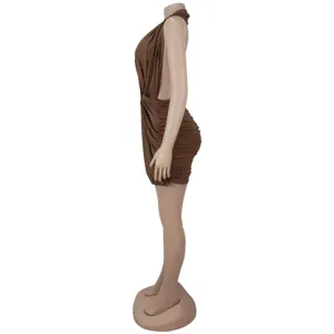 Side detail view of a sexy brown halter neck ruched bodycon mini dress on mannequin.
