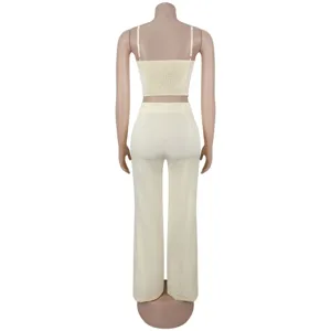 Back view details of the elegant solid color camisole and wide-leg trousers two-piece set.