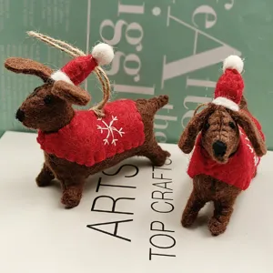 Handmade felt dog hanging ornament with Christmas hat and red sweater for holiday decoration.