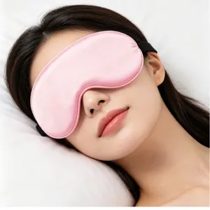 Pink silk sleep mask for women, soft breathable lightweight eye mask for sleeping and travel.