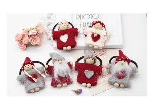 Handmade wool felt Christmas gnome hair ties, cute holiday festive hair accessories.