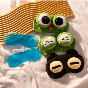 Süße Cartoon Frosch Plüsch Schlafmaske mit weichem hautfreundlichem Stoff und Kühlgelpackung für Augen.