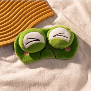 Nahaufnahme Details der niedlichen grünen Frosch Plüsch Augenmaske mit extrem weichem Stoff.