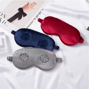 Imitation silk sleep mask with 3D floral embroidery, breathable and comfortable for travel.