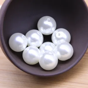 High gloss white ABS double-hole imitation pearl beads for DIY jewelry making and accessories.