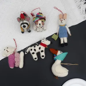 Handmade wool felt animal hanging ornaments detail view, cute cartoon pendants for bags.