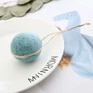 Wool felt ball pendant handmade decoration felt ball ornament close up detail view