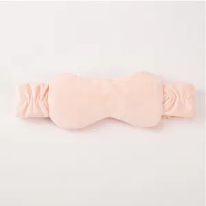 Soft plush 2-in-1 sleep mask and headband in pink, perfect for comfortable daily face washing.