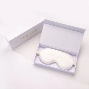Detailed close-up view of the luxury silk eye mask in gift box for comfortable sleep.