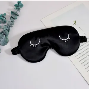 Schwarze Seiden-Schlafmaske mit süßen gestickten Wimpern, weiche Abdunklung für Augen.