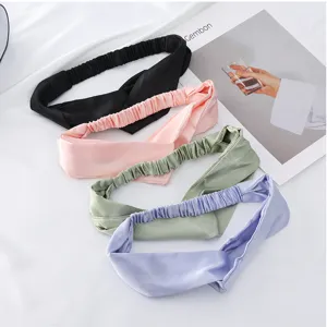 Satin solid color twist headband, comfortable elastic hair hoop for daily fashion styling.