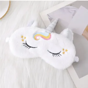 Cute plush unicorn sleep mask with soft embroidery details, perfect for comfortable resting.
