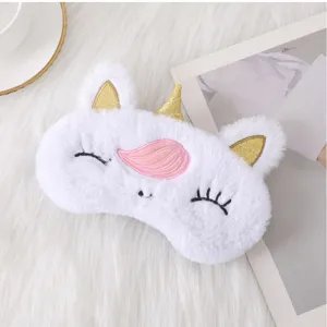 Cute plush unicorn sleep mask with soft fur, golden ears, and cute embroidery for sweet resting.