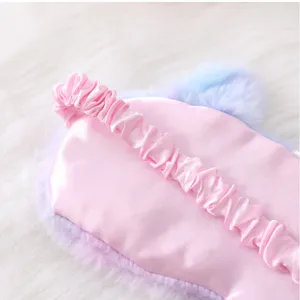 Cute plush rabbit hair sleeping eye mask with soft satin and cute unicorn ears detail view.