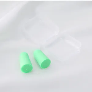 Soft foam earplugs detail view in light green with clear storage case for quiet sleep.