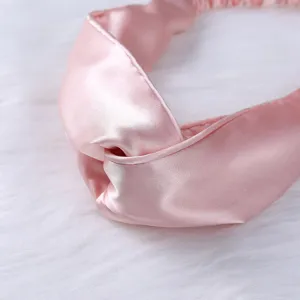 Rosa Satin Haarreif mit Knoteneffekt, breites Design aus Seidenimitat fuer den Alltag.