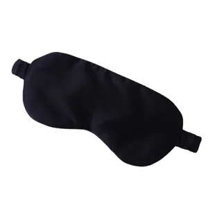 Masque de sommeil en pure soie au design noir classique pour un repos nocturne confortable et obscur.