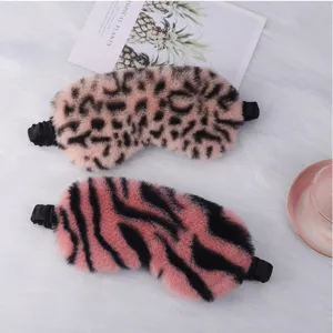Plush sleep mask set featuring trendy leopard and stripe patterns, soft and cozy for sleep.