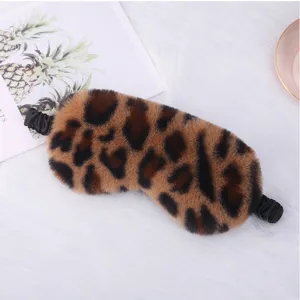Soft plush leopard print sleep mask with elastic strap, cozy blackout eye cover for comfortable rest.