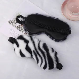 Soft plush sleep mask cute animal print fuzzy eye cover for comfortable resting and night sleeping.