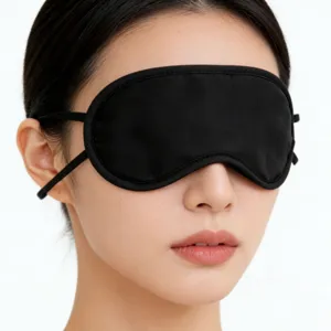 Masque de sommeil occultant noir confortable pour la détente, les voyages et la sieste.