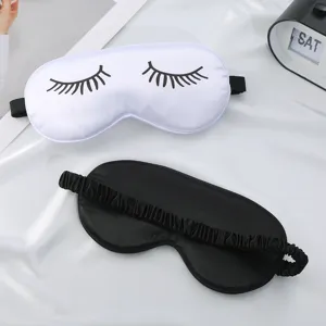 Silk sleep mask set, soft eye cover with eyelash print, comfortable for nighttime sleeping.