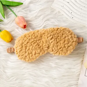 Comoda mascherina da sonno in peluche moka, morbida benda traspirante per il relax a casa.