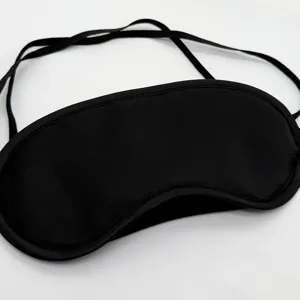 Masque de sommeil noir en polyester pour bloquer la lumiere, bandeau de voyage confortable.