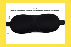 Detail view of black 3D contoured sleep mask showing ergonomic nose design and elastic strap.