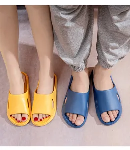 Comfortable couple home slippers in yellow and blue, anti-slip soft sole for indoor bathroom use.