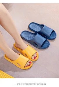 Comfortable home slide sandals with breathable side cutout and anti-slip sole design.