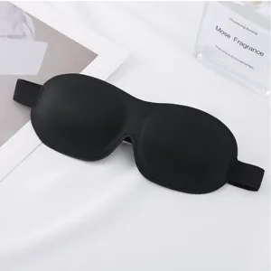 Gros plan masque de sommeil noir 3D ergonomique avec cavités oculaires respirantes pour obscurité totale.