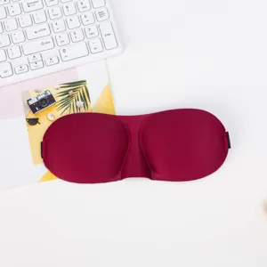 Comfortable 3D contoured sleep mask in dark red, breathable shading eye mask for travel.