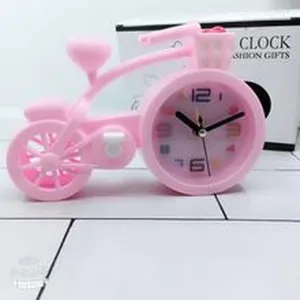 Pink bicycle alarm clock, creative plastic desktop decor model for student bedroom gift.