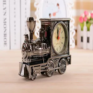 Detailed view of the vintage locomotive design alarm clock, featuring exquisite metallic texture.