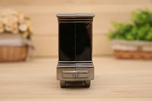 Vintage steam locomotive alarm clock side view, creative plastic model ornament.