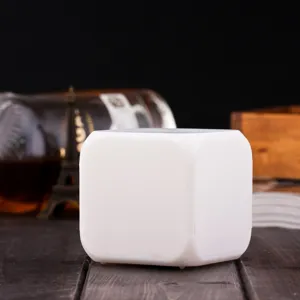 Square LED color-changing alarm clock detail view, compact electronic bedside night light white.