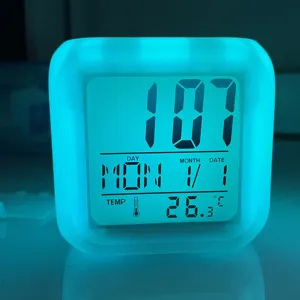 Colorful square digital alarm clock with LED color-changing night light and temperature display.