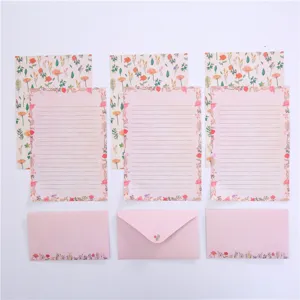 Floral stationery set with lined letter paper and pink envelopes, cute botanical design.